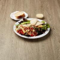 Chicken Cobb Salad · Diced tomato, crispy bacon, Roquefort cheese, avocado, grilled chicken, baby corn, mesclun a...