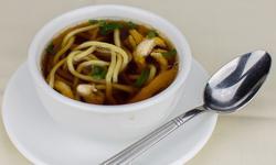 Chicken Noodle Soup · Clear broth and lo mein noodles or white rice, chicken pieces.