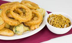 Vegetable Tempura · Assorted vegetables breaded and fried, served with lo mein on the side.