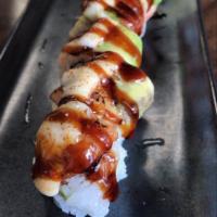 Heart Attack · Carlifornia roll topped with cook shrimp, BBQ eel, avocado, seared with garlic cream sauce, ...