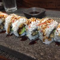 Snow Roll · Tempura shrimp, cucumber topped with imitation crab meat, unagi sauce and spicy mayo.