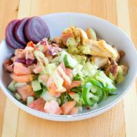 Grilled Chicken Salad Bowl · Bowl of mixed greens, cucumber, tomato, red cabbage, onions, radish, cilantro, zesty lemon d...