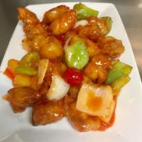 Sweet and Sour Chicken · Hold on to the tiki torches....crispy golden brown chicken is smothered in a sweet and sour ...