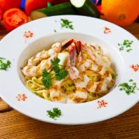 Shrimp Pasta · Served with garlic bread.