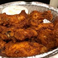 Buffalo Wings · Includes 8 wings served with bleu cheese.