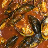 New Zealand Mussels · Includes 9 mussels served in a marinara sauce.