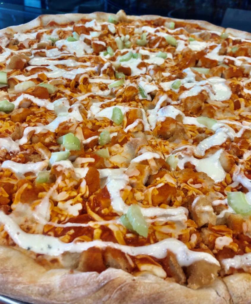Buffalo Wing Pizza Slice · Spicy sauce, diced chicken, bleu cheese and celery.