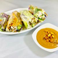 Vietnamese Fresh Spring Rolls · Served with spicy peanut sauce. Gluten free, spicy. You can request the rolls without jalape...