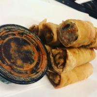 Mama Vu's Pork and Shrimp Eggrolls (7pcs) · Hand rolled by my mama =) Served with Sweet & Sour Sauce
