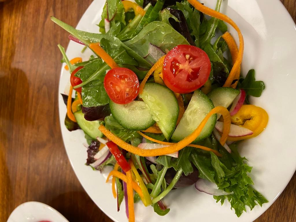 Black Pepper Vinaigrette Salad · Gluten Free, Vegan. Green Salad with Cucumbers, Radish, Tomato, Carrot. Homemade Simple Vinaigrette with dijon, lemon, EVOO