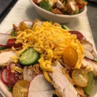 Crispy Chicken Ranch Salad · Chopped Fried Chicken with Ranch Salad, Cucumber, Tomato, Radish, Cheddar Cheese. Drizzle of...