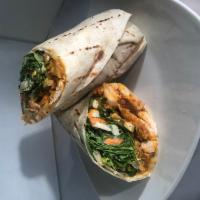 Buffalo Chicken Ranch Wrap · Grilled Chicken Tenders tossed in Buffalo Sauce with Cheddar Cheese, Buttermilk Crispies, an...
