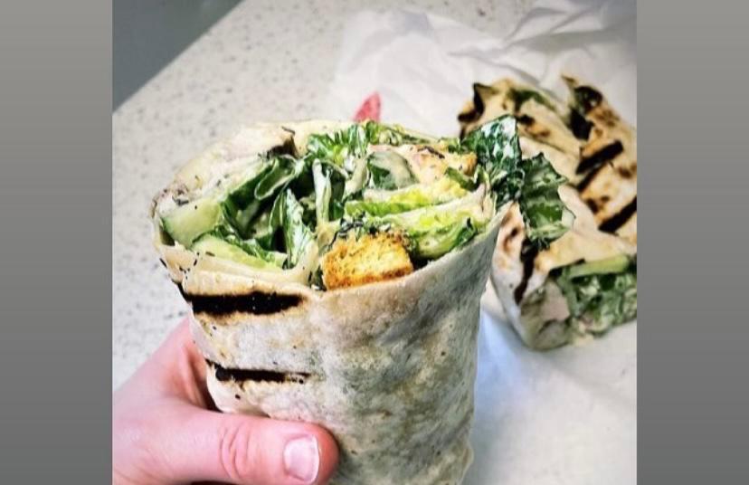 Grilled Chicken Ceasar Wrap · Grilled Chicken Tenders, Homemade Ceasar Dressing. Blackened Croutons, Mozzarella Cheese, Parmesan Cheese, Romaine salad with cucumber, tomato and radish