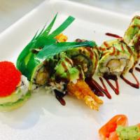 M24. Green Dragon Roll · Double shrimp tempura and cream cheese topped with avocado, eel sauce and fish roe. 8 pieces.