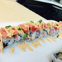 M25. Tornado Roll · Spicy tuna on top of California roll with spicy mayo, scallion and crunchy flakes. 8 pieces.