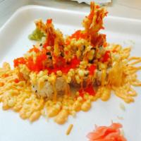 M13. Volcano Roll · Double shrimp tempura, spicy tuna and cucumber topped with crunch, masago and spicy mayo. 8 ...