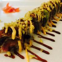 M22. Diamond Roll · Eel and avocado on top of salmon, tuna and cucumber, topped with crunch, eel sauce and spicy...