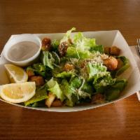 The Caesar Salad · Green salad with Caesar dressing and cheese. 