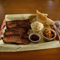 Smoked Beef Brisket Plate · Served with a slice of bread and choice of 2 sides.