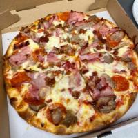 Carnivore Pizza · Pepperoni, sausage, meatball, ham and bacon.
