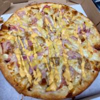 Hawaiian Cordon Bleu Pizza · Chicken cutlet, ham, Swiss, mozzarella, pineapple and Thousand Island.