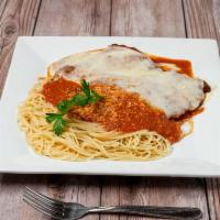 Chicken Parmigiana · Breaded chicken topped with marinara sauce and melted mozarella cheese. Served over your cho...
