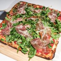 Toscana Pizza  · Prosciutto di Parma, arugula, shaved reggiano and olive oil.