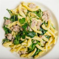 Casarecce with Sausage and Broccoli Rabe · Fresh ground pork sauteed with broccoli rabe, garlic and oil.