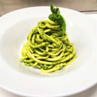 Bucatini with Pesto · Made with pine nuts.