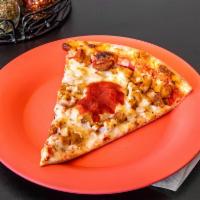 Chicken Parmigiana Pizza · Stripes of breaded chicken, tomato sauce smothered with mozzarella.