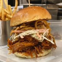 BBQ Pulled Pork Sandwich · 6 hour slow roasted pork, horseradish slaw, tobacco onions, sesame bun, fries.