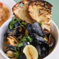 Mussels Thailandaise · Lemongrass, coconut curry broth, grilled country bread.