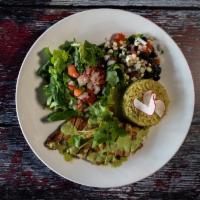 Chipotle Lemon Chicken Bowl · Spring mix and cilantro rice with pico de gallo, fresh guacamole, com and black beans, toppe...