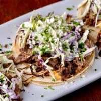 Tiger Street Tacos · Three corn tortillas stuffed with Steak and homemade coleslaw, secret sauce adds a bit of a ...