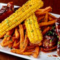 All Beef Ribs w Corn and Sweet Potato FF · Fall off the bone ribs, served with a stack of Sweet potato FF and Corn on the cob