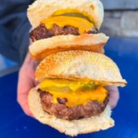 Kids Pocket Burgers · Beef sliders, cheddar, ketchup, mustard and pickles.