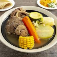 Caldo De Res  · Beef Shank soup with potatoes carrots corn squash, served with a side of rice onions and tor...