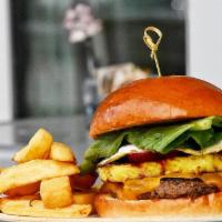 Beef Burger  · Certified Angus beef patty, cheddar, romaine, pickles, house chutney with chunky rosemary fr...