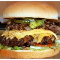 Double Deluxe Special Burger · Served with 1/3 lb beef patty, Lettuce, Tomato, Pickles, Mayo, Mustard, Ketchup, Sauteed oni...