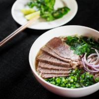 Smoked Beef Brisket Pho'  · smoked beef brisket, rice noodles, cilantro, scallions, red onion, our 8 hours house-made be...