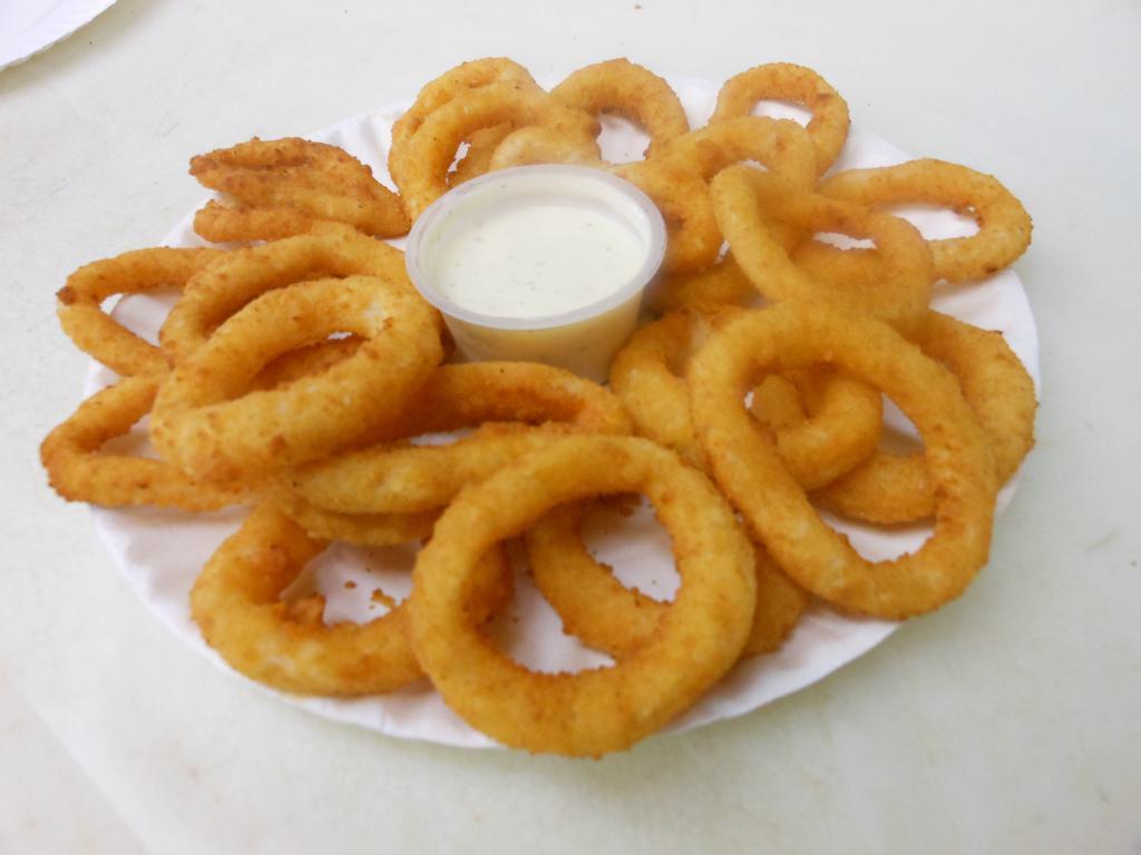 Onion Rings · Oven baked onion rings comes with sauce on the side.