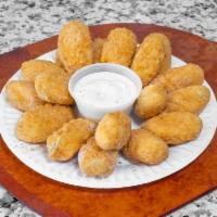 Jalapeno Poppers · 10 pieces of jalapeno poppers, filled with cream cheese and slices jalapeno, and a ranch dip...