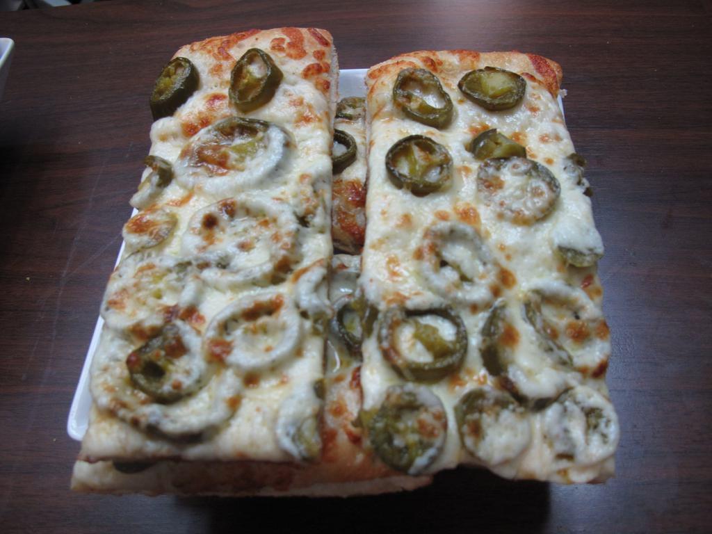 Jalapeno Sticks · Pizza bread, topped with mozarella cheese and sliced jalapeno peppers.