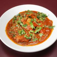 Chicken Curry · Broiled chicken cooked with tomatoes, onion sauce and curry paste.