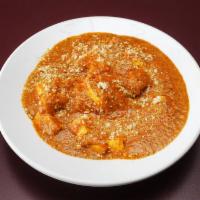 Paneer Tikka Masala · Gourmet farmers cheese cooked in tomatoes, onion and nuts.