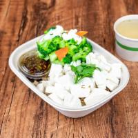 The Vegetarian · Organic tofu, brown rice and seasonal veggies.