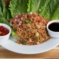 Lettuce Wraps · Leaves of romaine lettuce, to be filled with a stir-fry mix of chicken, water chestnuts, red...