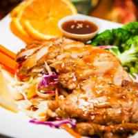 82. Teriyaki Chicken · Teriyaki chicken served over steamed vegetables topped with teriyaki sauce. Served with your...