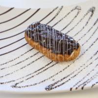 Chocolate Eclairs · Delicate flaky pastry filled with luscious cream filling then lavishly doused with chocolate.