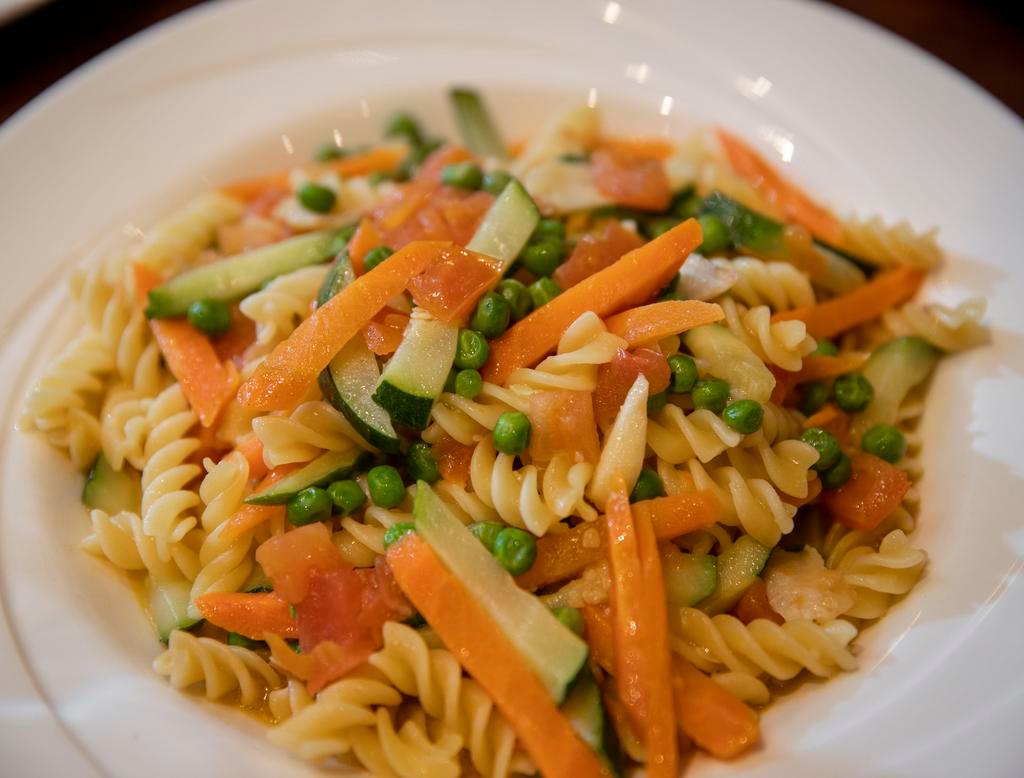 Pasta Primavera · Fresh vegetables, diced tomatoes, garlic and olive oil.